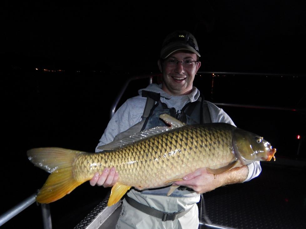 Alan with a large common carp from Lake Macatawa
